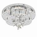 Plafonnier cristal K9 chromé à LED dimmable installé au plafond d'une chambre