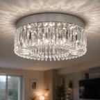 Plafonnier cristal LED Vaux-le-Vicomte argent dans un salon